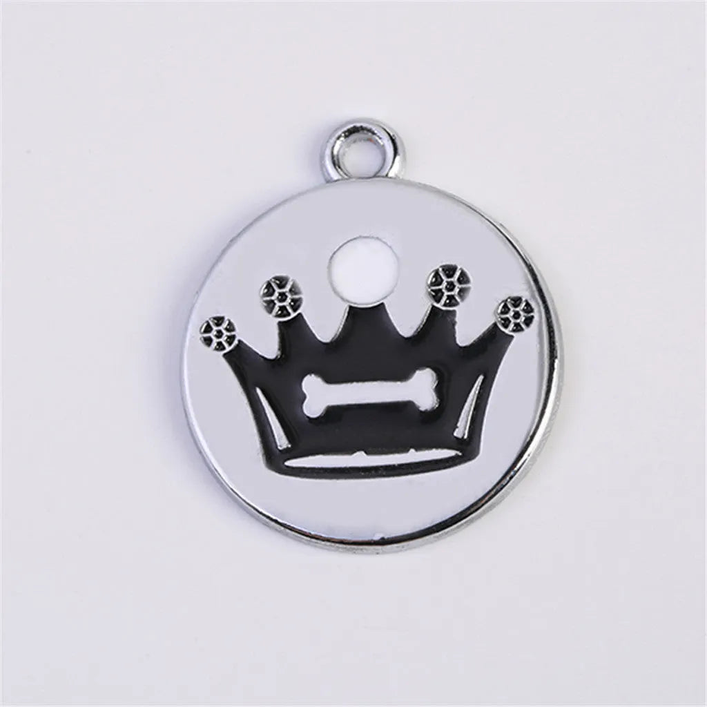 Zinc alloy pet ID tag, 25mm round disc, shown in black, dark blue, pink, purple, and red for dog or cat collars.
