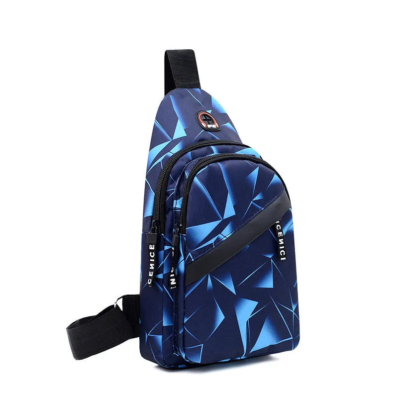 Men's medium blue Oxford cloth crossbody bag showing earphone hole and zipper opening.