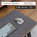 Winter warm grey felt and cork mouse mat with Japanese simple style on office desk