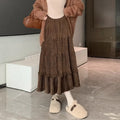 Beige corduroy A-line midi skirt with elastic waistband shown on mannequin