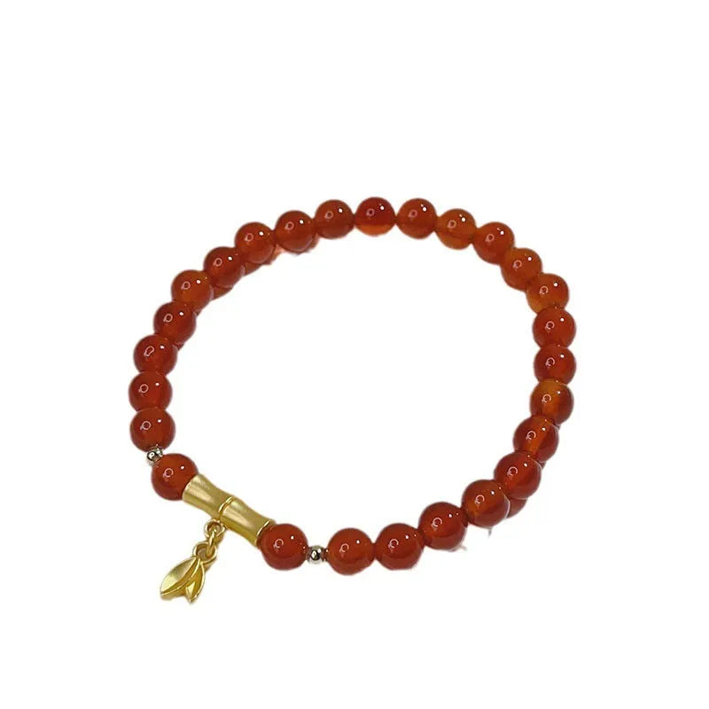 Red agate bracelet with Chinese lucky bag design and dragon motifs for women
