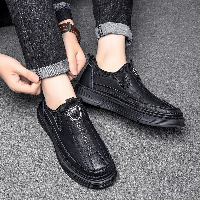 Men's casual leather shoes with round toe design in black or brown solid colours
