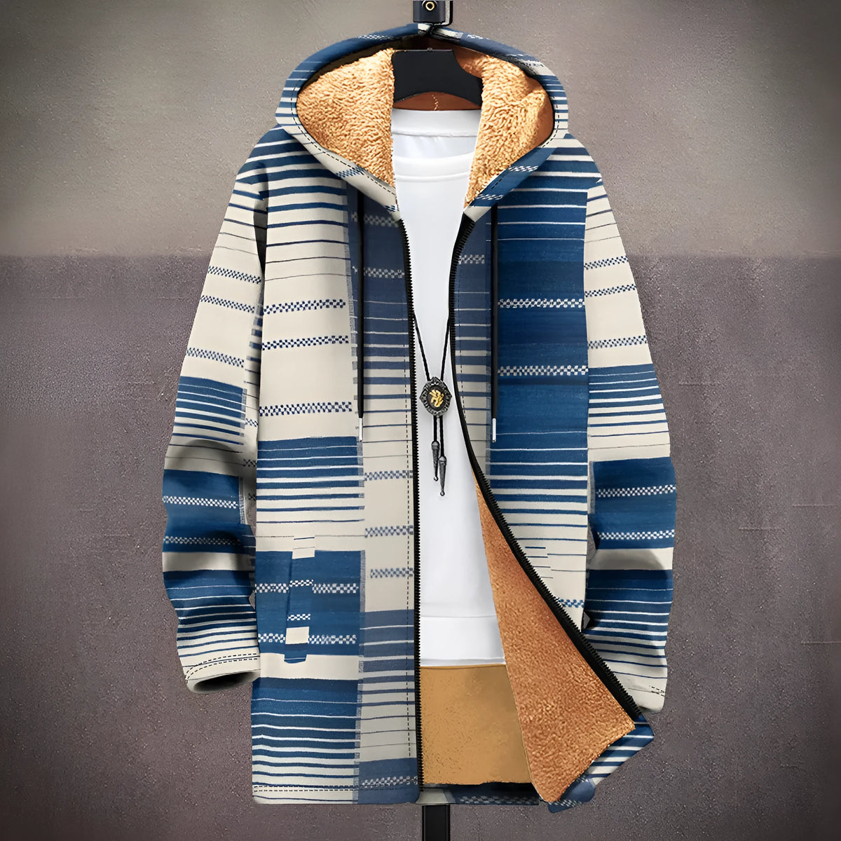 Man wearing a multicolour patterned zip-up hooded cardigan in a loose fit style.