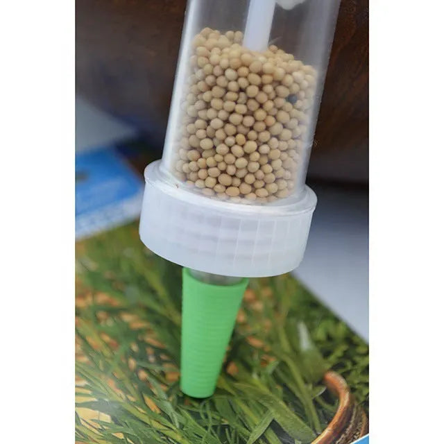 Mini seed sower 12 cm long, 3 cm diameter, PP PS ABS plastic with steel spring for pots and plug trays