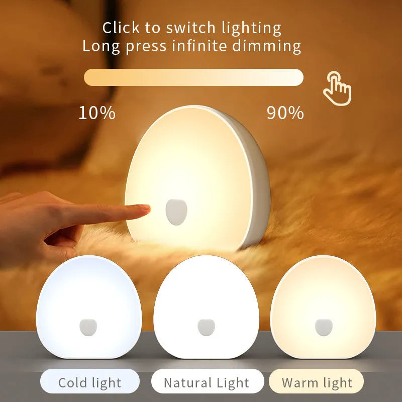 White rechargeable baby night feeding comforter with music function on nursery table
