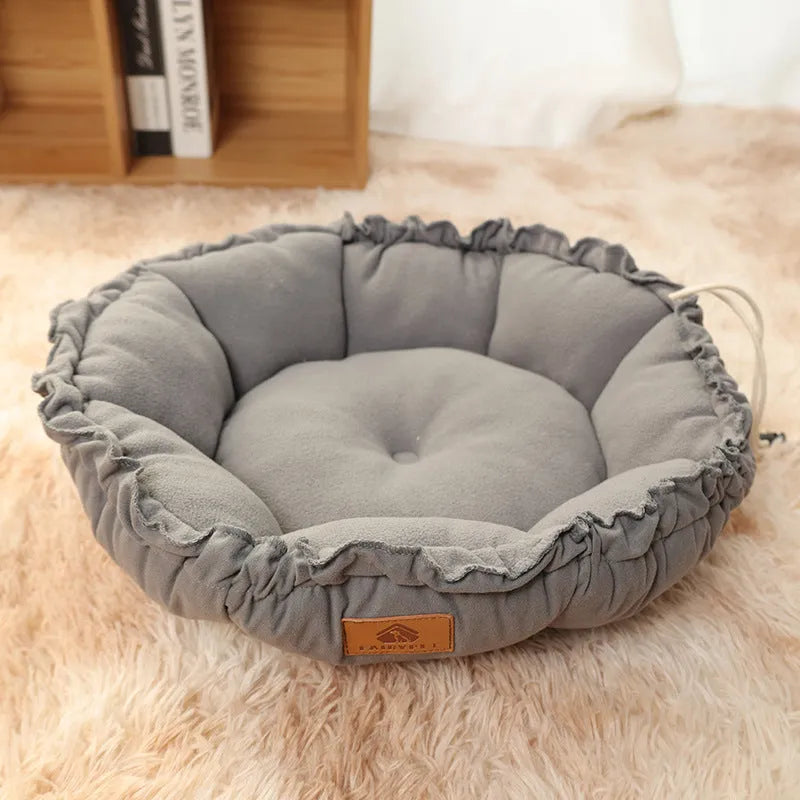 Grey and green reversible donut pet bed for cats and small dogs showing dual sleeping surfaces