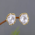 Irregular freshwater pearl drop earrings with gold-toned alloy metal findings in white and gold