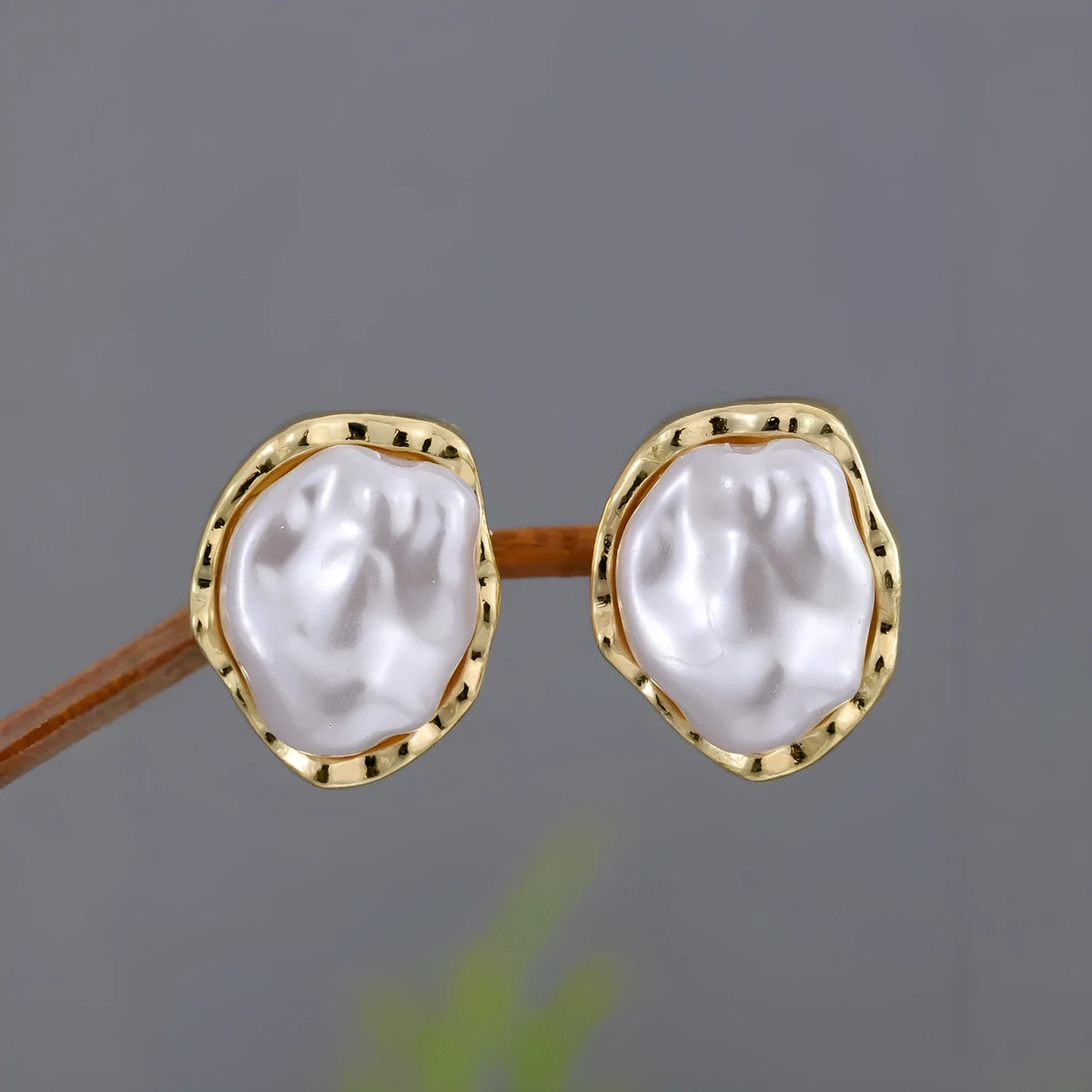 Irregular freshwater pearl drop earrings with gold-toned alloy metal findings in white and gold