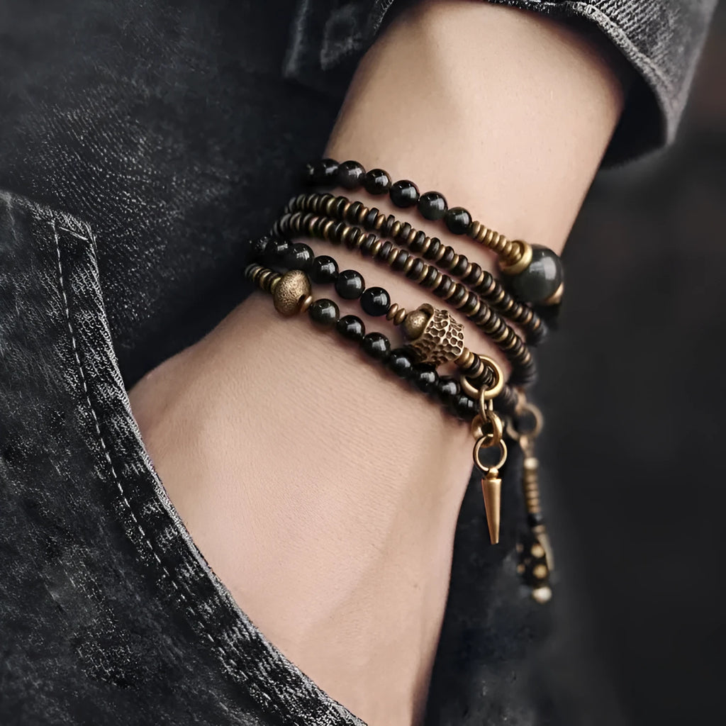 Black geometric multi layered bead bracelet with retro colourful beads on adjustable strap
