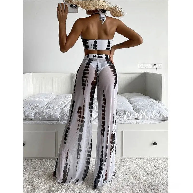 Women's black printing three-piece swimsuit set with mesh trousers, bikini top, and underpants.