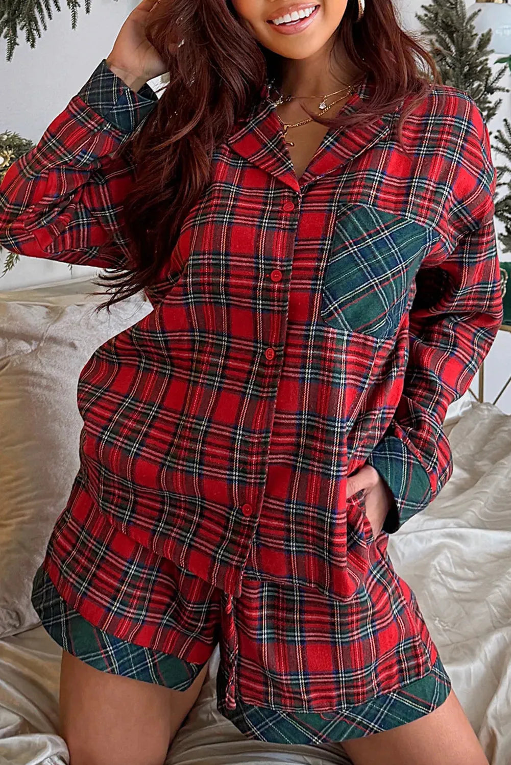 Red plaid long sleeve shirt and shorts from a men's Christmas pajama set.