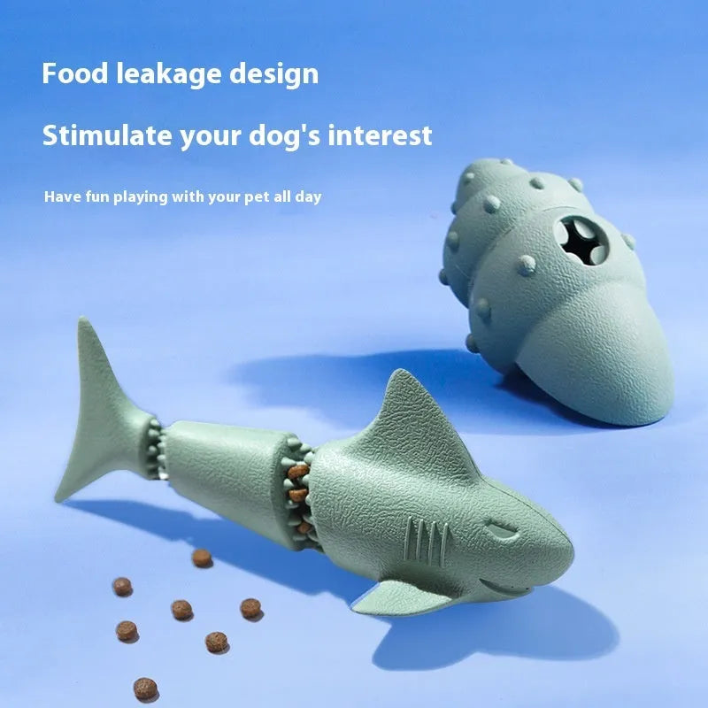 Rubber shark-shaped dog toy with ocean theme details in blue or green colour options