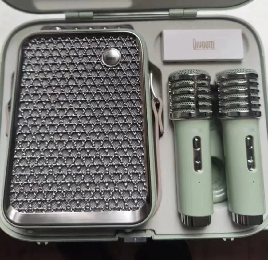 Dual microphone Bluetooth speaker suit in green or white with one audio unit and two microphones for karaoke
