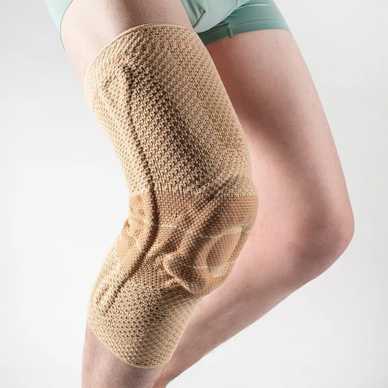 Sports knee pads in black and blue or grey and blue colours for basketball and running protection