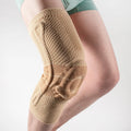 Sports knee pads in black and blue or grey and blue colours for basketball and running protection