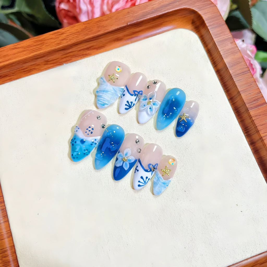 Blue hand-painted carved summer ice transparent plastic fake nails with dimensional design