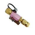 Metal valve core disassembly tool set showing black and pink valve removers with wrench attachment.