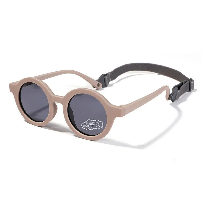 Children's silicone sunglasses with round frame for 0-3 year olds showing colour options
