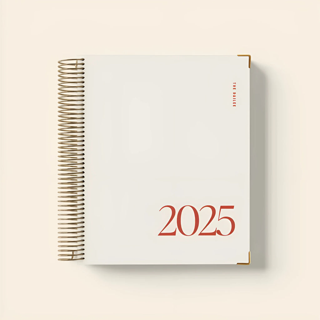 Cherry red spiral-bound daily schedule notebook with A5 size format and coil binding