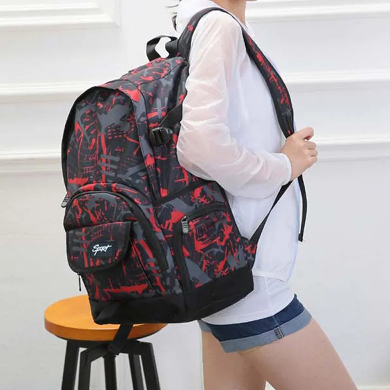 Classic blue and red nylon backpack with large capacity and padded straps.