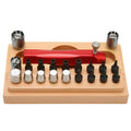 Set of 20 steel watch repair extracting tubes for opening watch cases on a repair mat.