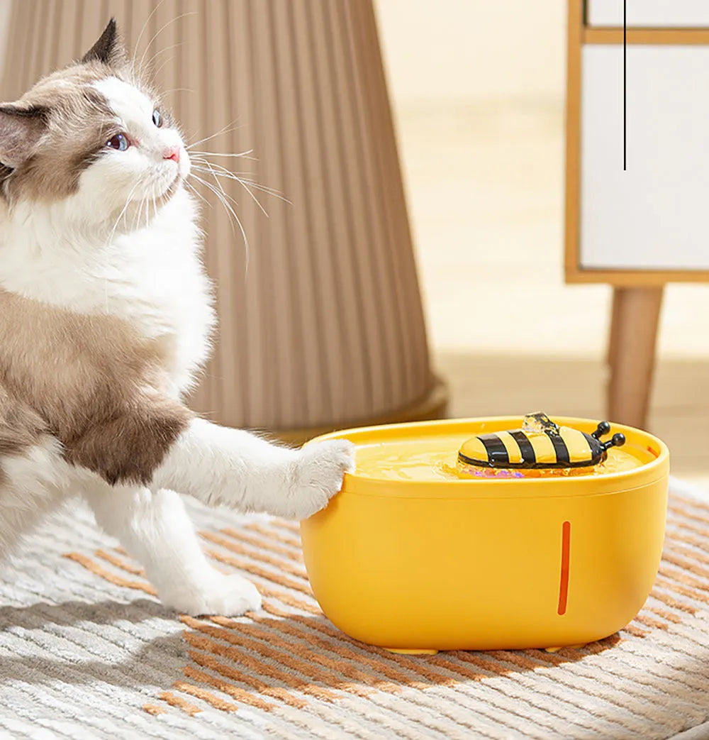 Yellow automatic cat water fountain with filtration system and USB power connection