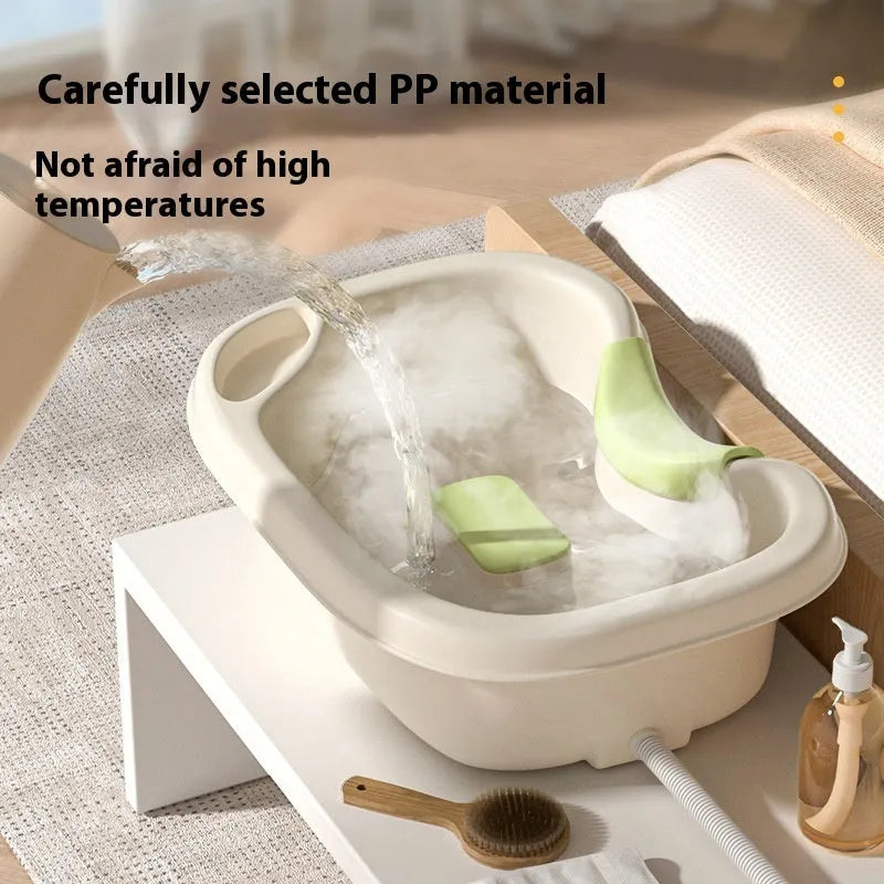 Beige and light pink plastic shampoo basin set for bed use with pump, pillow, and brush.