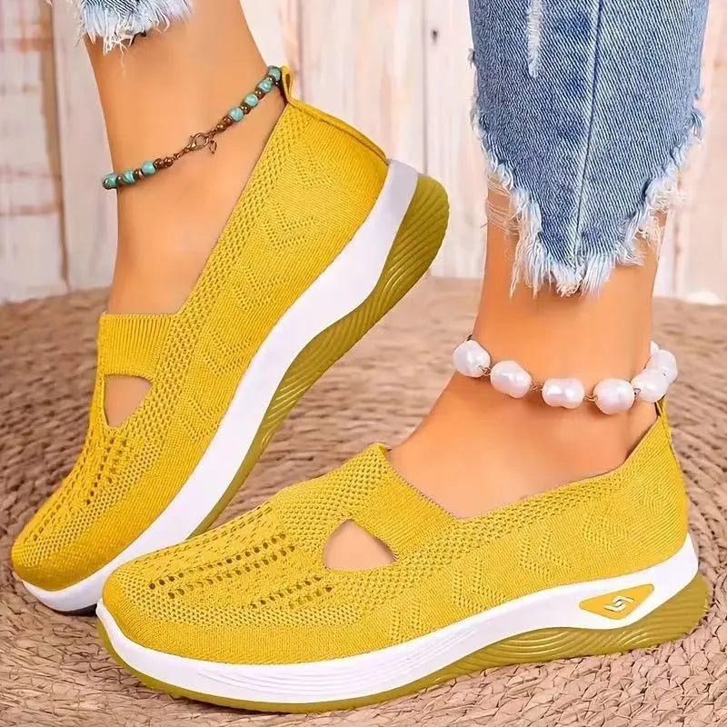 Women's casual T-strap mesh shoes with a round toe and flat heel in multiple colours.