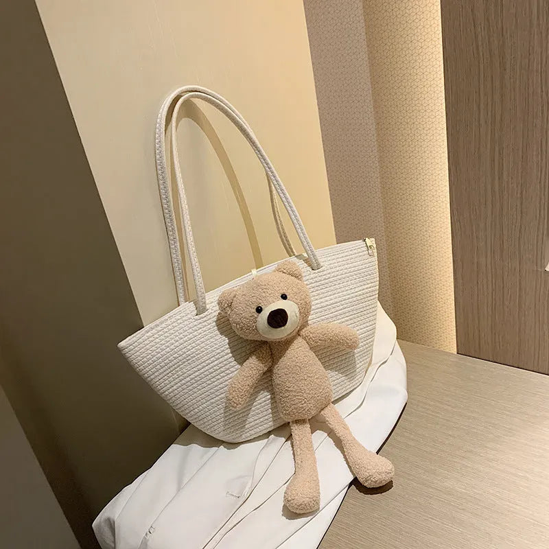 Cotton linen woven bag in dumpling shape with double shoulder straps available in six colours