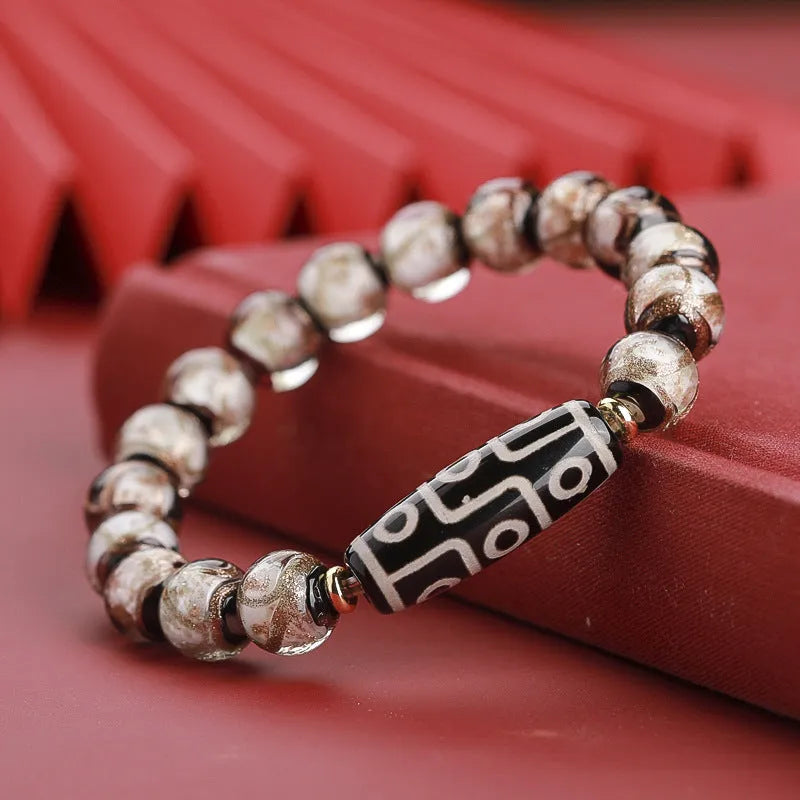 Traditional Chinese coloured glaze bracelet with year snake and lucky bead elements in ancient five-colour design