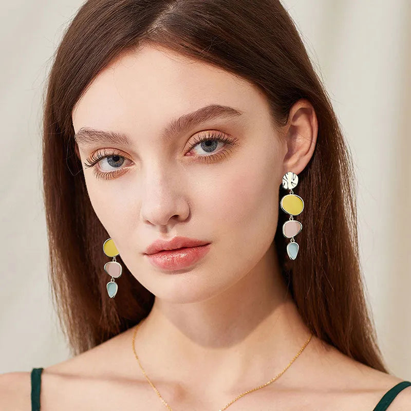 Morandi three-colour wafer disc earrings with dripping oil effect on sterling silver finish alloy.