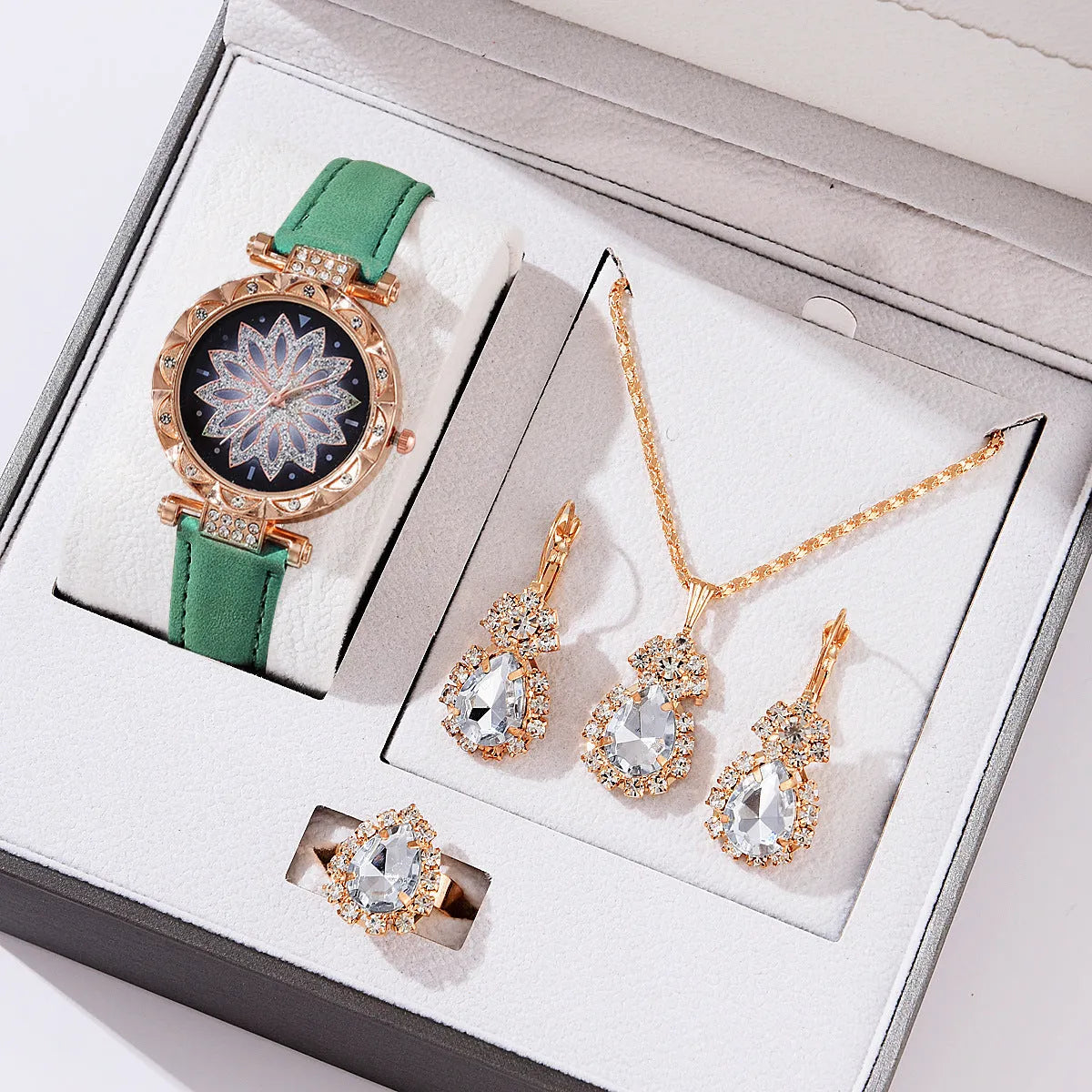 Women's quartz watch bracelet set with faux leather strap, stainless steel buckle, and matching jewellery