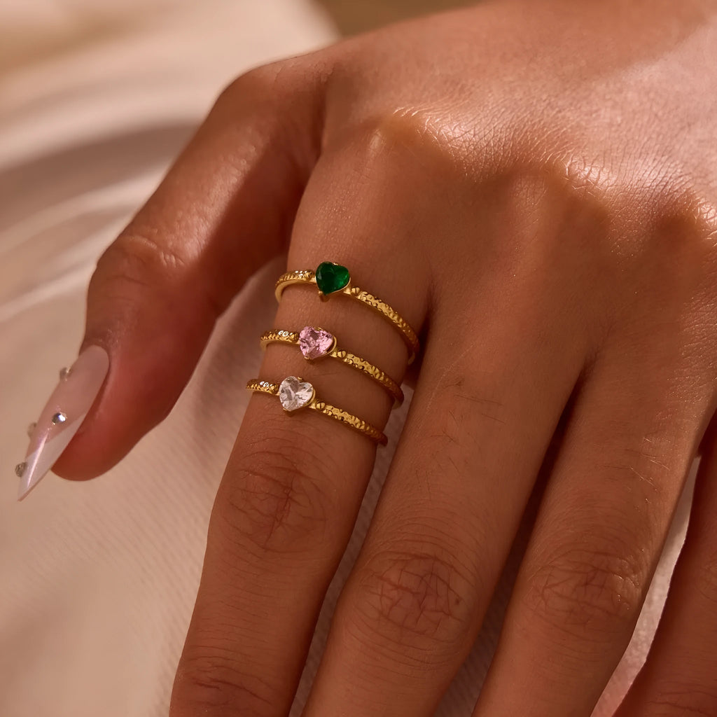 Open ended geometric heart shaped ring with inlaid zircon stones in stainless steel