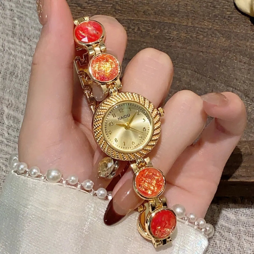Women's quartz watch with a round 25mm dial in a choice of six colours on a wrist.