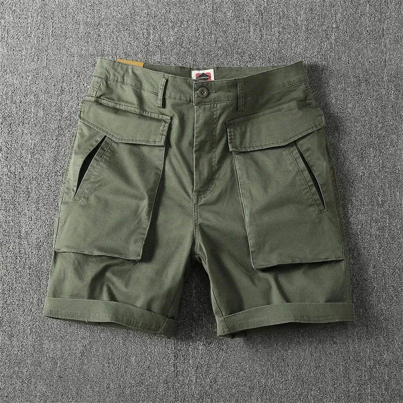 Men's straight leg cotton cargo shorts in khaki colour with multiple pockets.
