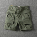 Men's straight leg cotton cargo shorts in khaki colour with multiple pockets.