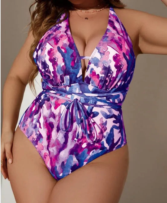 Women's solid colour one-piece halter swimsuit in purple or blue with briefs cut