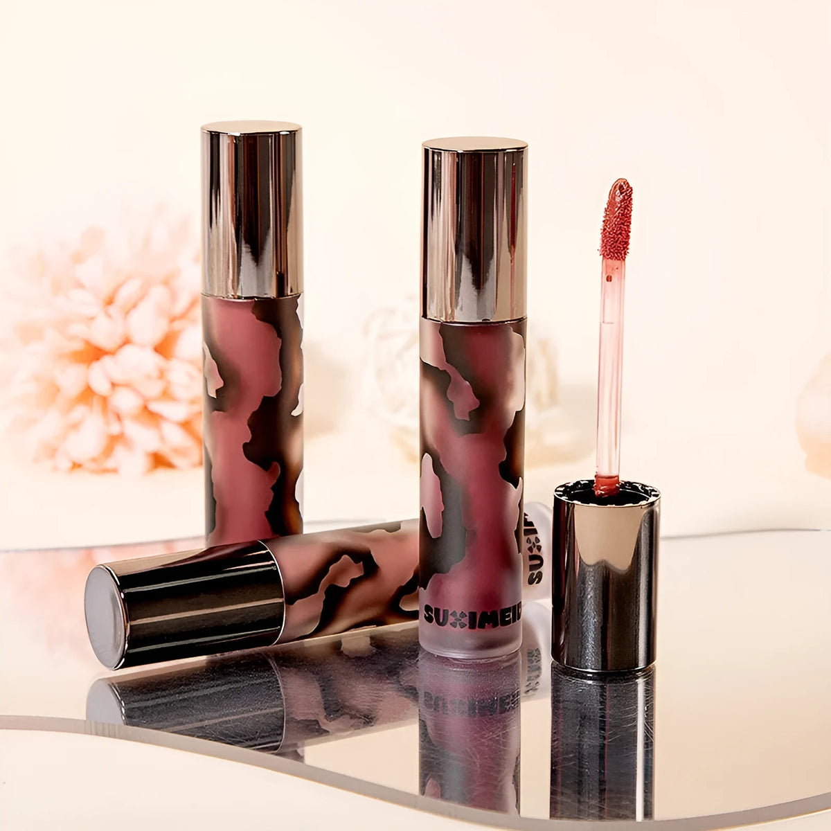 Lava Secret Matte Lip Mud Lipstick bullet in one of five colours: orange brown, cool gray, cinnamon, red, or purple.