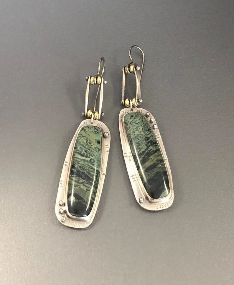 Geometric two-tone marble pattern alloy drop earrings on a white background