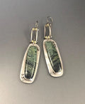 Geometric two-tone marble pattern alloy drop earrings on a white background