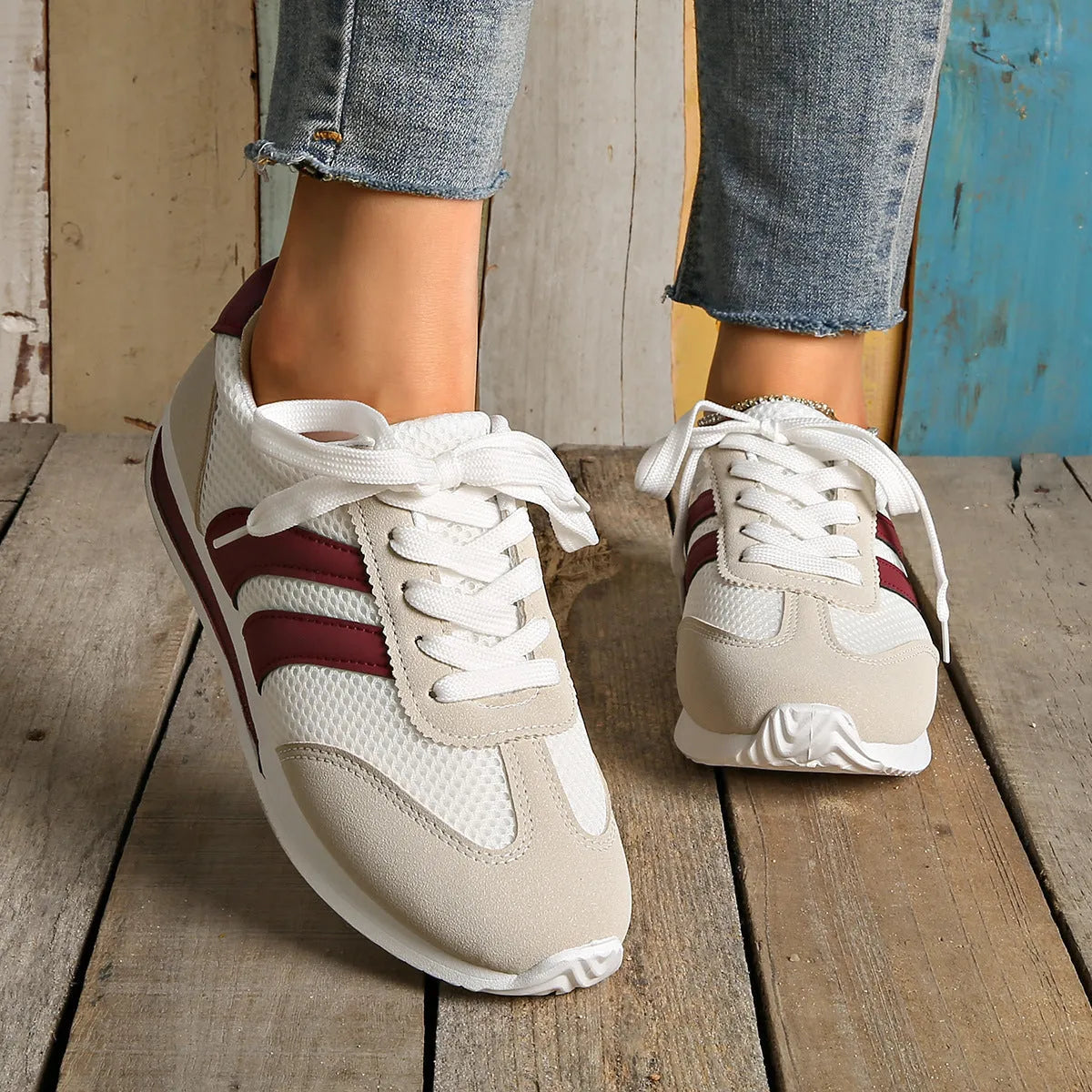 Wine red Cortez retro sneaker with breathable mesh surface and cross straps, low top flat heel, sizes 36-43