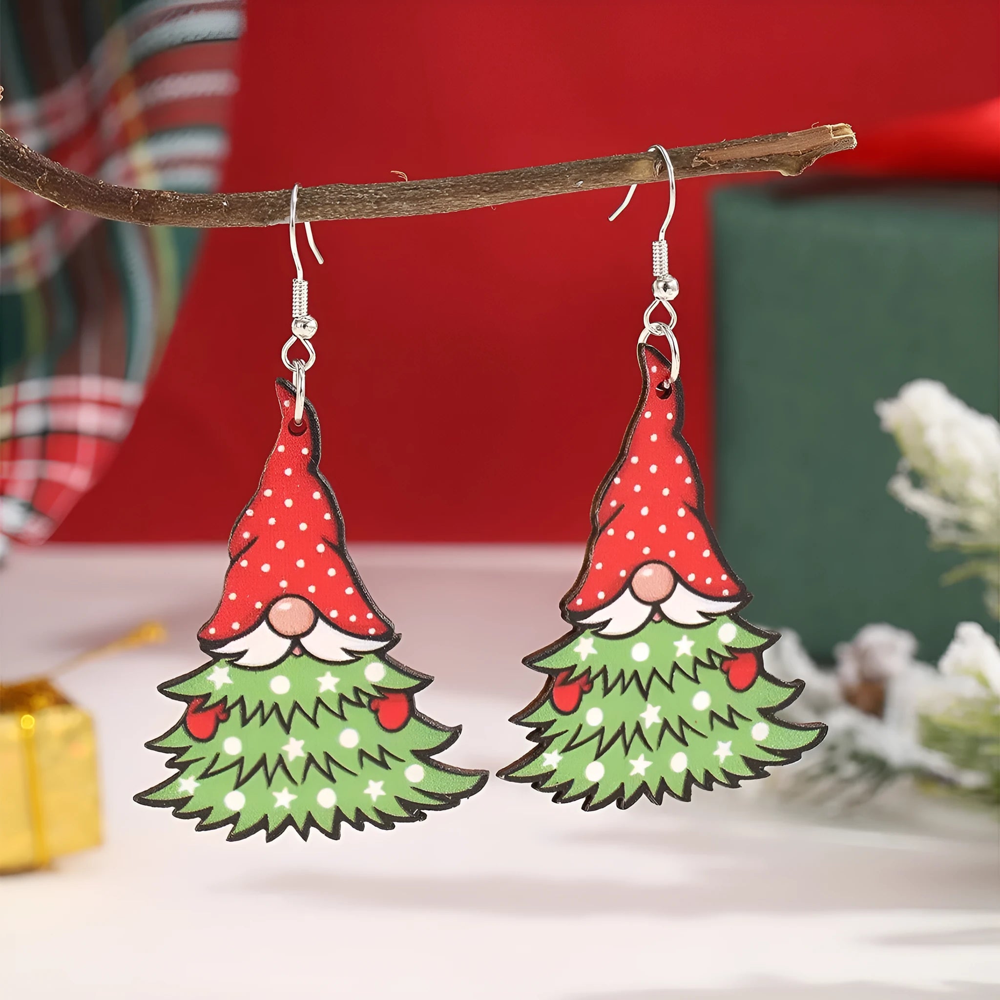 Wooden geometric earrings with printed Christmas tree and snowman Santa Claus designs.