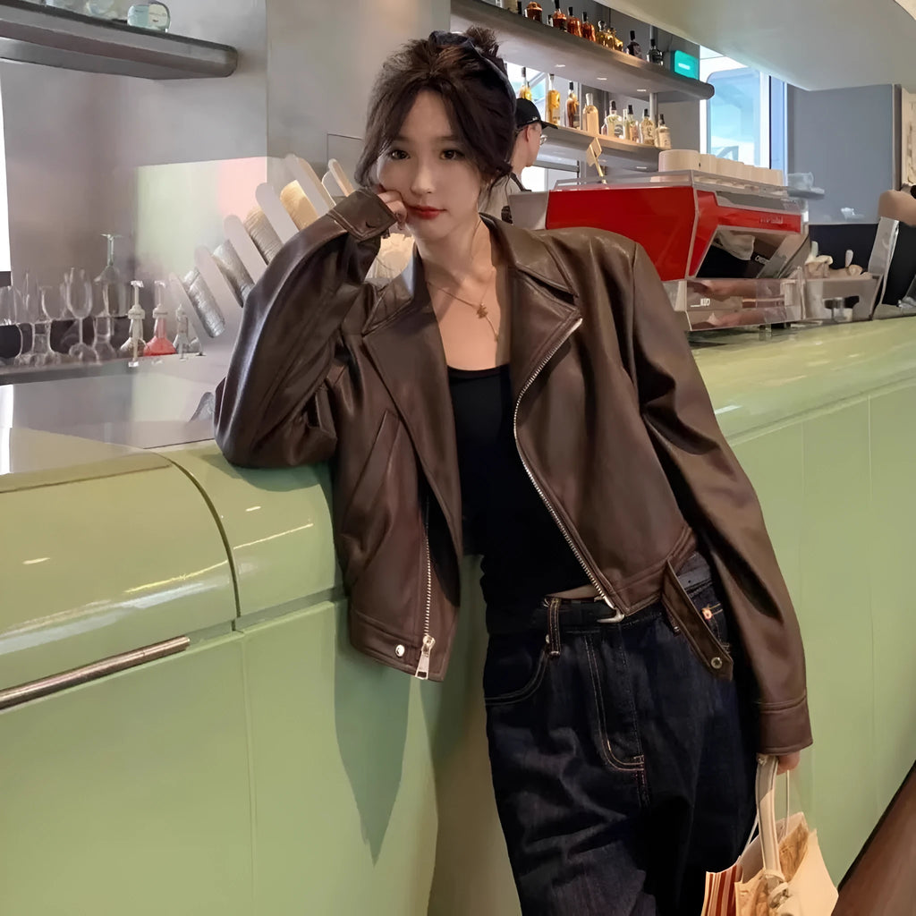 Women's brown retro slim fit imitation leather coat with long sleeves and pockets.
