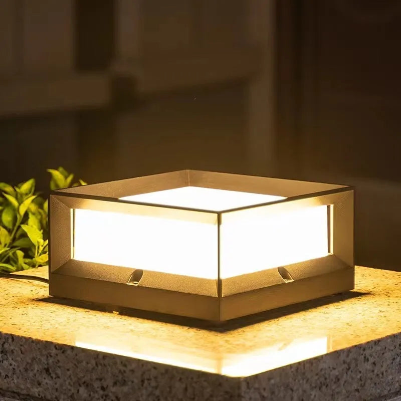 Aluminium outdoor solar-powered LED column light in two size options for garden or doorway use.