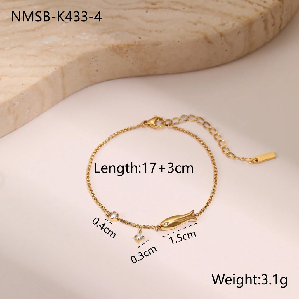 Titanium steel bracelet with 18K gold plating and geometric zircon star pendant