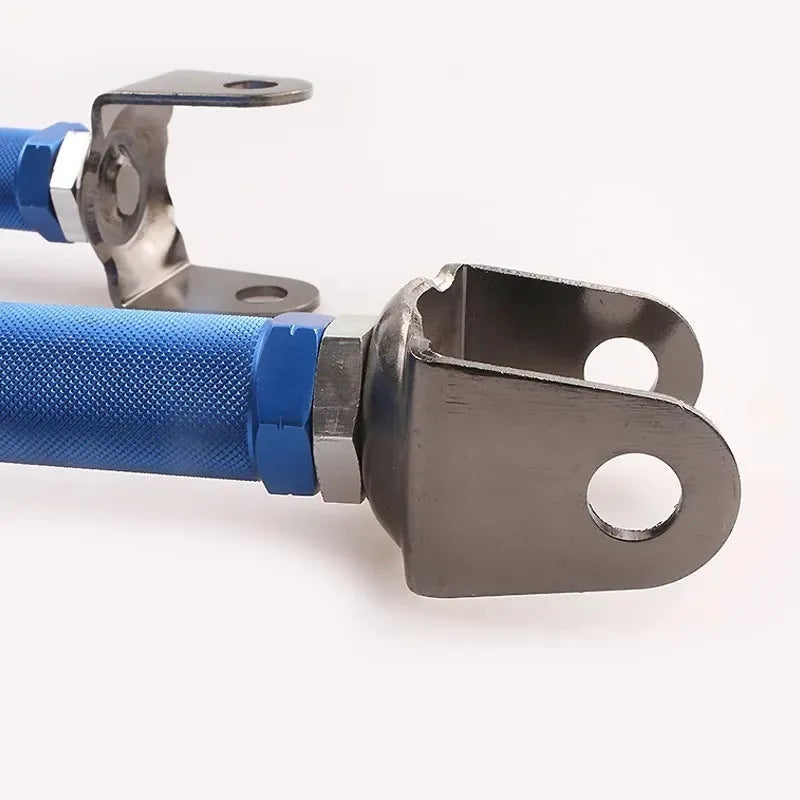 Blue and red aluminium alloy ES bone recliner components for Honda Civic EP3 rear suspension.