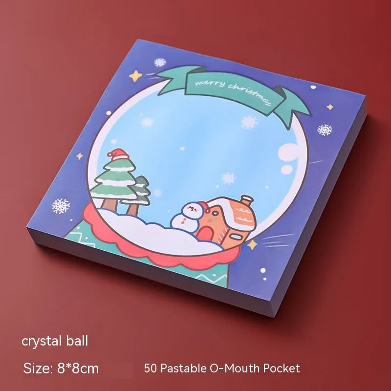 Christmas cartoon sticky notes pad with festive designs including Santa Claus and snowman