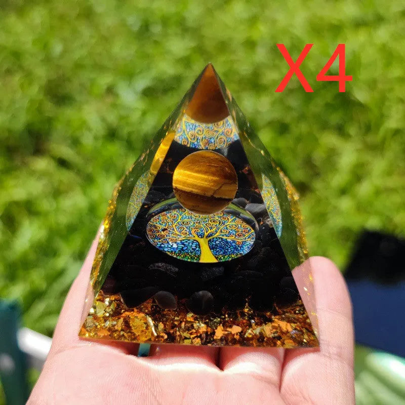 Small 6cm crystal epoxy resin pyramid decoration with natural gravel, shown in a selection of colours including lapis lazuli and obsidian.