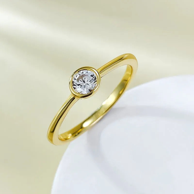 Minimalist crown-shaped silver ring with linear design in electroplated gold or platinum finish.
