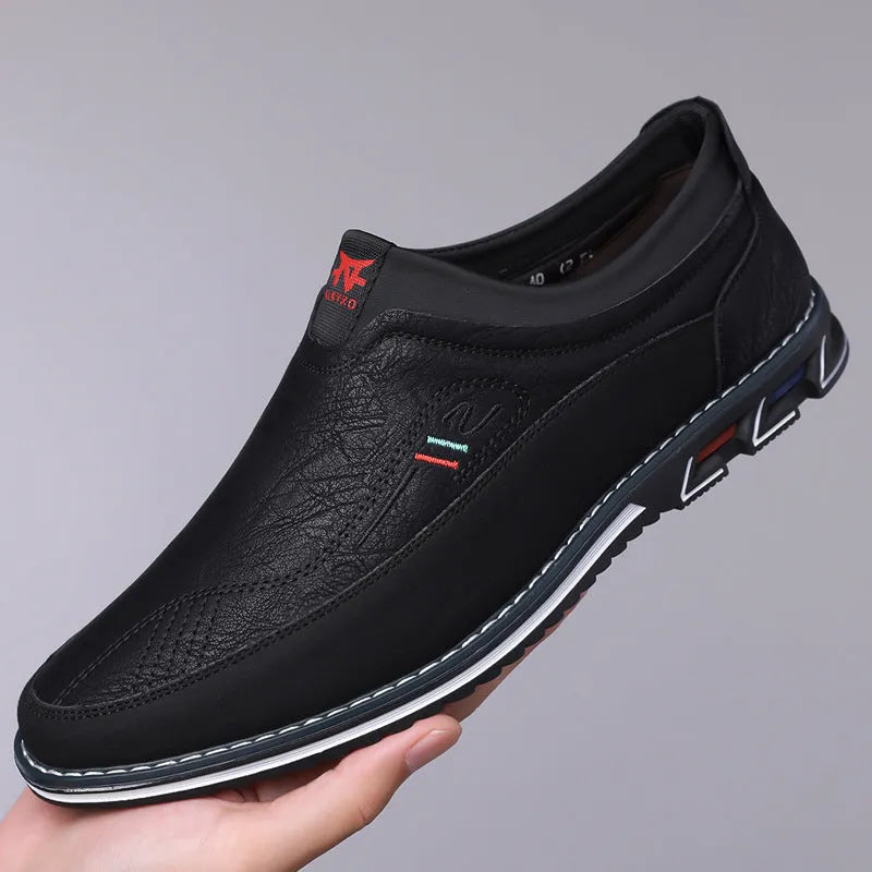 Men's low-top casual leather shoe in multiple colours with rubber sole and sewing line detail.